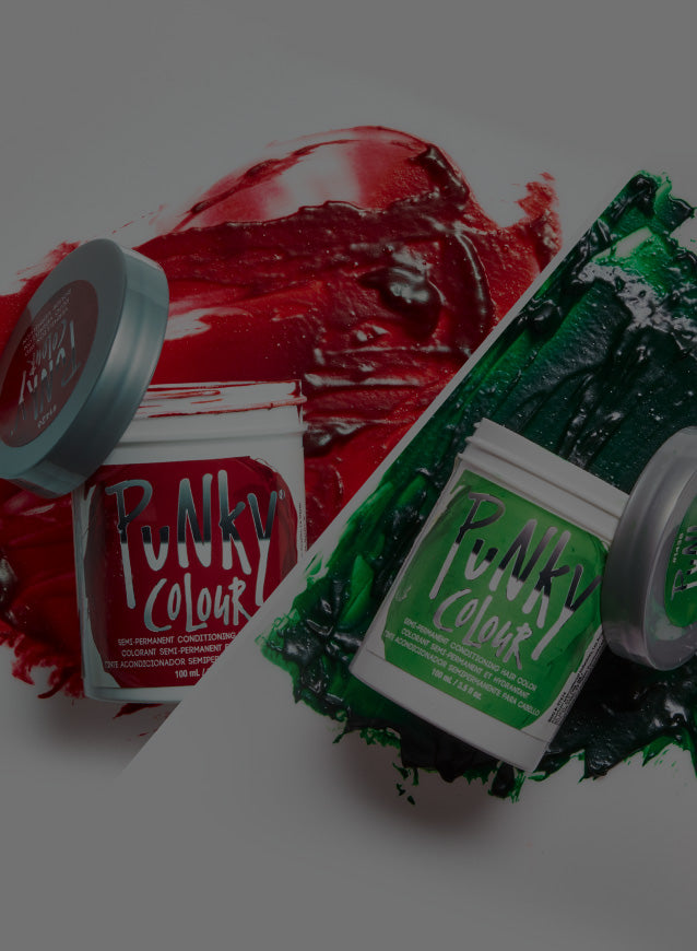 Two containers of Punky Colour hair dye, one red and one green, on a white background.