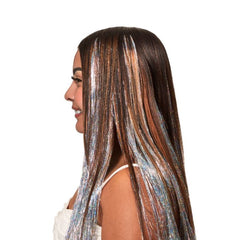 Side View of Model Wearing Silver Hair Tinsel - Woman with long brown hair featuring shimmering silver tinsel highlights.